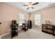 Bright bedroom featuring a ceiling fan and a desk at 7130 Maricopa Rd, Charlotte, NC 28277