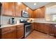Well-equipped kitchen with stainless steel appliances, granite countertops, and ample cabinet space, perfect for cooking at 7130 Maricopa Rd, Charlotte, NC 28277