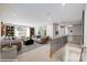 Open-concept living room showcasing neutral tones and lots of natural light at 9957 Cask Way, Huntersville, NC 28078
