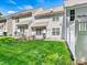A lovely backyard with green lawn, privacy fence, and a well-maintained exterior of the home at 10063 Reindeer Way Ln, Charlotte, NC 28216