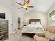 Charming bedroom with vaulted ceiling, neutral carpet, and ensuite access to bathroom at 10063 Reindeer Way Ln, Charlotte, NC 28216