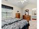 Tranquil bedroom featuring vaulted ceiling, dresser, and ensuite access to bath at 10063 Reindeer Way Ln, Charlotte, NC 28216