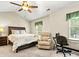 Bright bedroom with vaulted ceiling, neutral carpet, and ample natural light from windows at 10063 Reindeer Way Ln, Charlotte, NC 28216