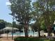 Community pool area featuring a pool, seating, and a gazebo at 10063 Reindeer Way Ln, Charlotte, NC 28216