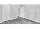 Bedroom featuring hardwood flooring and access to additional rooms at 1102 Grady St, Salisbury, NC 28144