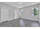 Bedroom featuring luxury vinyl plank floors, natural light, and a closet at 1102 Grady St, Salisbury, NC 28144