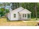 Well-maintained single-Gathering home exterior, featuring a covered porch and manicured landscaping at 1102 Grady St, Salisbury, NC 28144
