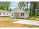 Charming exterior view of a newly built two-story home with a landscaped yard and a concrete driveway at 1102 Grady St, Salisbury, NC 28144