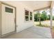 Inviting front porch featuring neutral-colored walls and concrete floor at 1102 Grady St, Salisbury, NC 28144