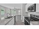 Modern kitchen featuring granite countertops, stainless appliances, and an eat-in kitchen at 1102 Grady St, Salisbury, NC 28144