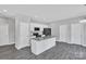 Modern kitchen boasts white cabinets, granite countertops, and stainless steel appliances at 1102 Grady St, Salisbury, NC 28144