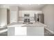 Kitchen featuring white cabinets, stainless steel appliances, and granite countertops at 1102 Grady St, Salisbury, NC 28144