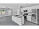 Modern kitchen with stainless steel appliances, and an island with a sink at 1102 Grady St, Salisbury, NC 28144