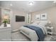Main bedroom with neutral tones, natural light, and a ceiling fan at 1102 Grady St, Salisbury, NC 28144