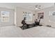 Spacious bonus room with exercise equipment and natural light at 1306 San Gabriel Ave, Charlotte, NC 28214