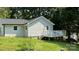 Nice back of house featuring a white railed elevated deck, perfect for entertaining at 148 Forest Heights Dr, Mcadenville, NC 28101