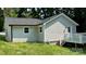 Nice back of house featuring a white railed elevated deck, perfect for entertaining at 148 Forest Heights Dr, Mcadenville, NC 28101