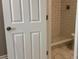 Bathroom with a white door and a marble tile stand up shower at 148 Forest Heights Dr, Mcadenville, NC 28101