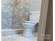 Bathroom featuring modern tile and new toilet at 148 Forest Heights Dr, Mcadenville, NC 28101