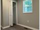 Bedroom with grey walls, laminate flooring, a closet, and a window at 148 Forest Heights Dr, Mcadenville, NC 28101