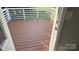 A wooden deck with white railings at 148 Forest Heights Dr, Mcadenville, NC 28101
