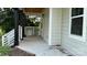 Spacious front porch with white railings, ideal for relaxing and enjoying the outdoors at 148 Forest Heights Dr, Mcadenville, NC 28101