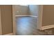 Room featuring new wood-look flooring and neutral paint at 148 Forest Heights Dr, Mcadenville, NC 28101