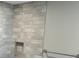 Bathroom shower with modern tile and built in storage at 148 Forest Heights Dr, Mcadenville, NC 28101