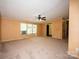 Spacious living room with bright windows at 155 Springdale Acres Dr, Mooresville, NC 28115