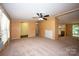 Cozy living room featuring an open layout, neutral colors, and great natural light at 155 Springdale Acres Dr, Mooresville, NC 28115