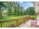 Relaxing back deck perfect for enjoying peaceful views of the large fenced yard and trees at 1632 Charles Raper Jonas Hwy, Mount Holly, NC 28120
