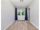 This bedroom features a large window with curtains and plush carpeting at 1632 Charles Raper Jonas Hwy, Mount Holly, NC 28120