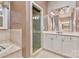 Elegant bathroom featuring a glass shower, soaking tub, double sink vanity, and neutral color scheme at 187 Spring Run Dr, Mooresville, NC 28117