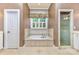 Luxurious bathroom featuring a soaking tub, a separate shower, and a large window at 187 Spring Run Dr, Mooresville, NC 28117