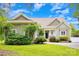 Charming two-story home with manicured lawn, stone accents, and a welcoming front entrance at 187 Spring Run Dr, Mooresville, NC 28117