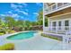 Inviting backyard pool area with meticulously maintained landscaping and a two-story deck at 187 Spring Run Dr, Mooresville, NC 28117
