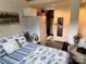 Bedroom featuring a comfortable bed, storage solutions, and a view to additional space at 1895 Sandy Cir, Newton, NC 28658