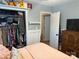 Comfortable bedroom featuring ample closet space, a plush bed, and an inviting doorway at 1895 Sandy Cir, Newton, NC 28658