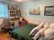 Bright bedroom with nautical decor, light blue walls, and wainscoting at 1895 Sandy Cir, Newton, NC 28658