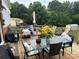 Spacious outdoor deck with dining table and chairs, perfect for entertaining at 1895 Sandy Cir, Newton, NC 28658