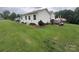 Exterior featuring a garden, deck, brick foundation, and vinyl siding at 1895 Sandy Cir, Newton, NC 28658