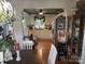 Farmhouse-style kitchen featuring classic cabinets, wood floors, and decorative trim at 1895 Sandy Cir, Newton, NC 28658