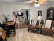 Open-concept living area with hardwood floors, a dining area, and a bright, inviting atmosphere at 1895 Sandy Cir, Newton, NC 28658