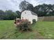 Storage shed with a star on the door, offering ample space for gardening equipment at 1895 Sandy Cir, Newton, NC 28658