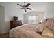 Spacious bedroom with wood floors, a fan, and a cozy, inviting atmosphere at 1912 8Th Se St, Hickory, NC 28602