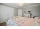 Serene bedroom with wood floors, fresh white trim, and a comfortable bed with floral bedding at 1912 8Th Se St, Hickory, NC 28602