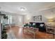 Inviting living room with hardwood floors, blue sofa and lots of light at 1912 8Th Se St, Hickory, NC 28602