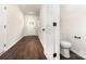 Inviting entryway with wood floors and a door with glass inserts allowing natural light to flow in the space at 2043 Sadler Woods Ln, Charlotte, NC 28214