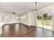 Bright living space with sliding glass doors leading to the outside, complemented by abundant natural light from the windows at 2051 Sadler Woods Ln, Charlotte, NC 28214