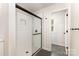 Modern walk-in shower features white subway tiles, matte black hardware, and tile flooring at 2051 Sadler Woods Ln, Charlotte, NC 28214